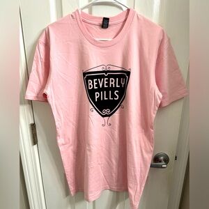 Brand new without tags women’s T-shirt, size medium.